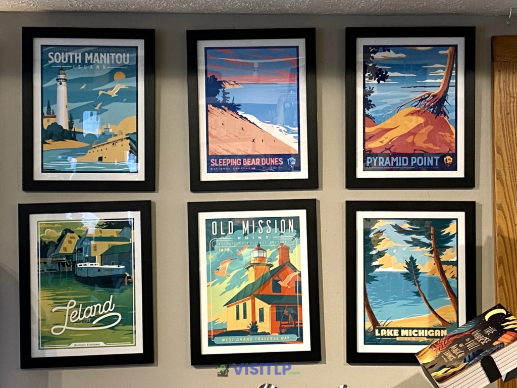 Framed artwork at Two Fish Gallery in Leland