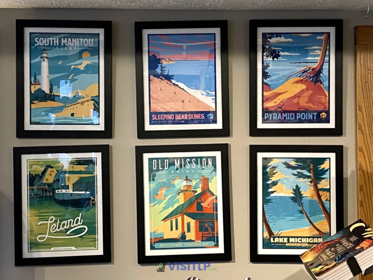Framed artwork at Two Fish Gallery in Leland