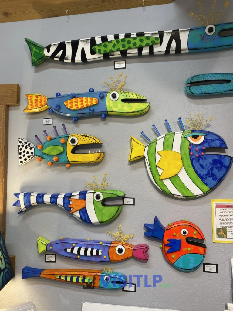 Colorful fish artwork at Two Fish Gallery in Leland