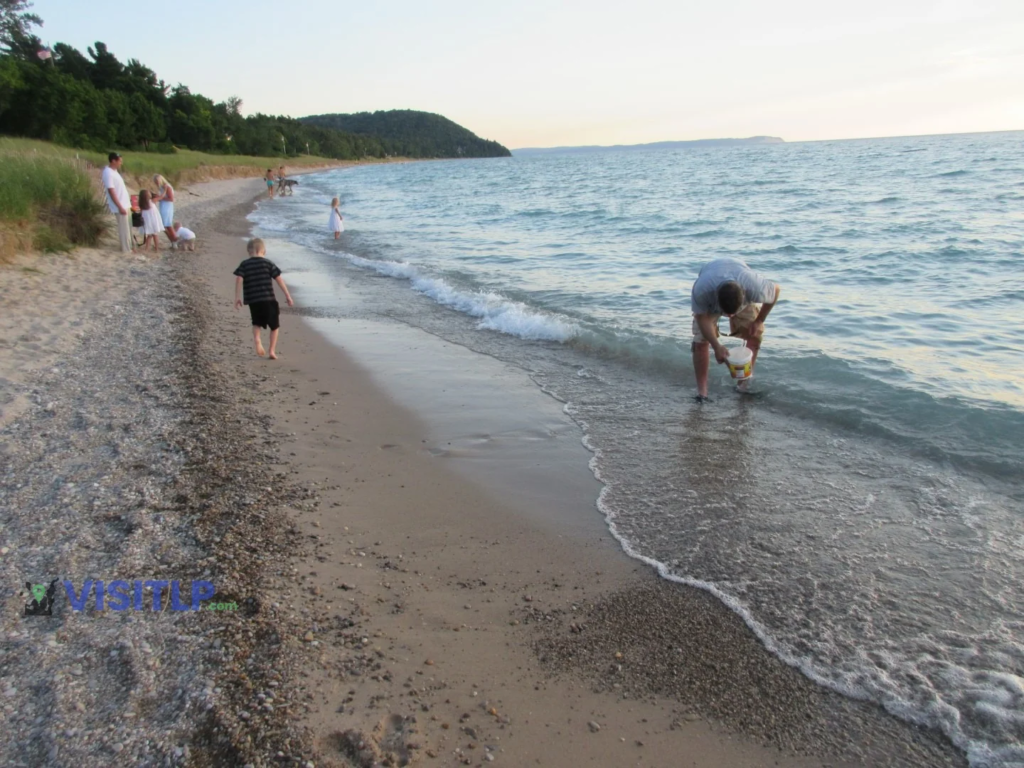 Rock hunting on a Leland beach